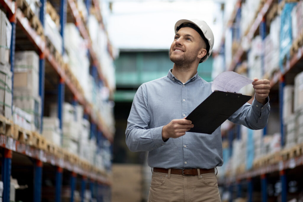 medium-shot-smiley-man-warehouse